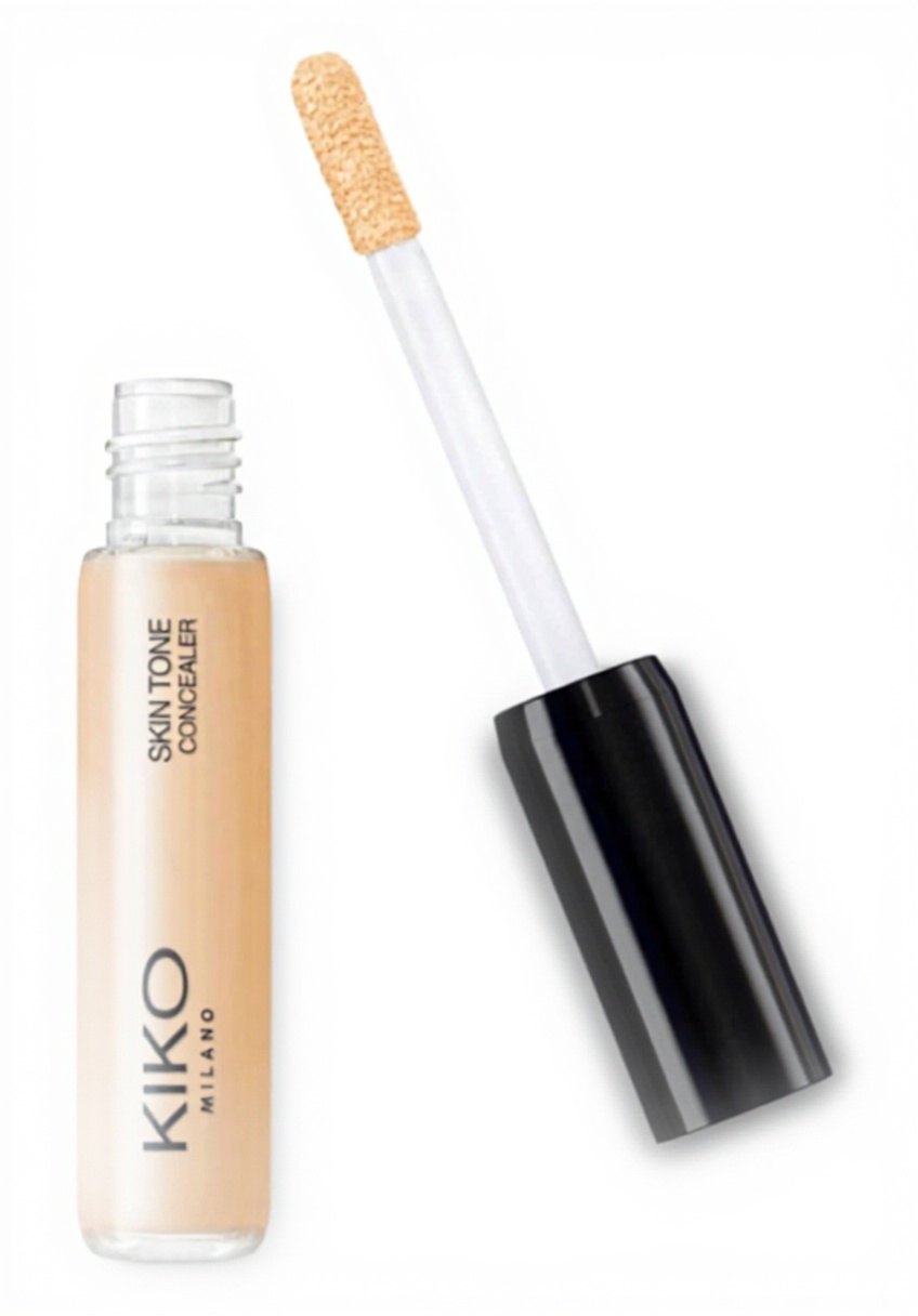 Application du correcteur KIKO Milano sur le visage